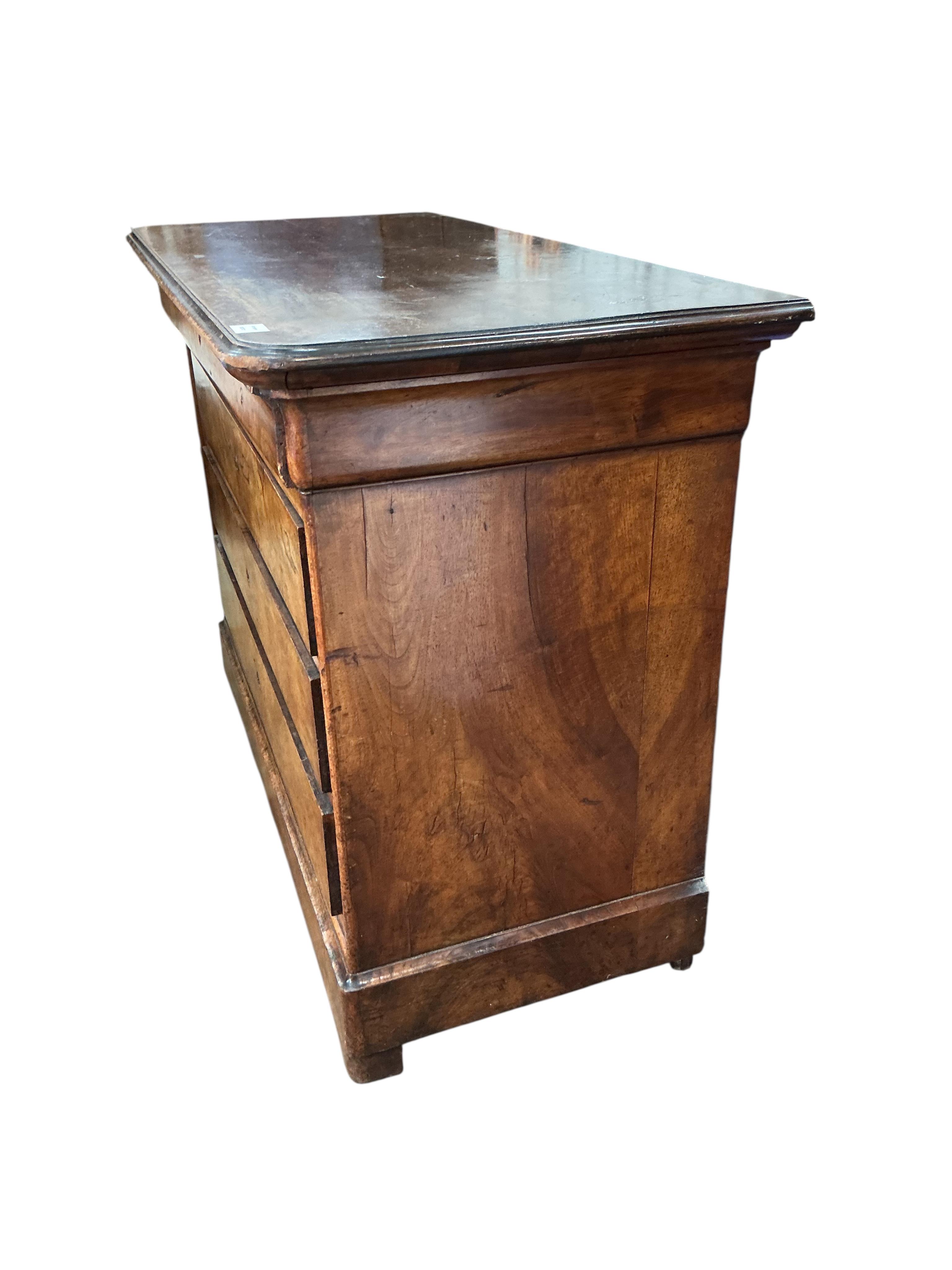 A 19th century French walnut commode, width 130cm, depth 60cm, height 97cm